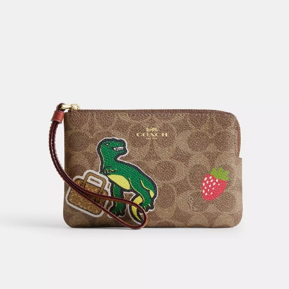 Coach Brown Wristlet with Dinosaur and Strawberry Patches